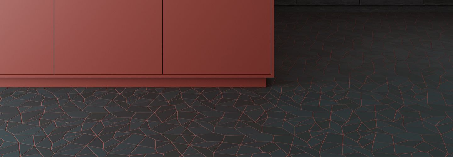 Floor with Gaudi-inspired dark tile with red grout