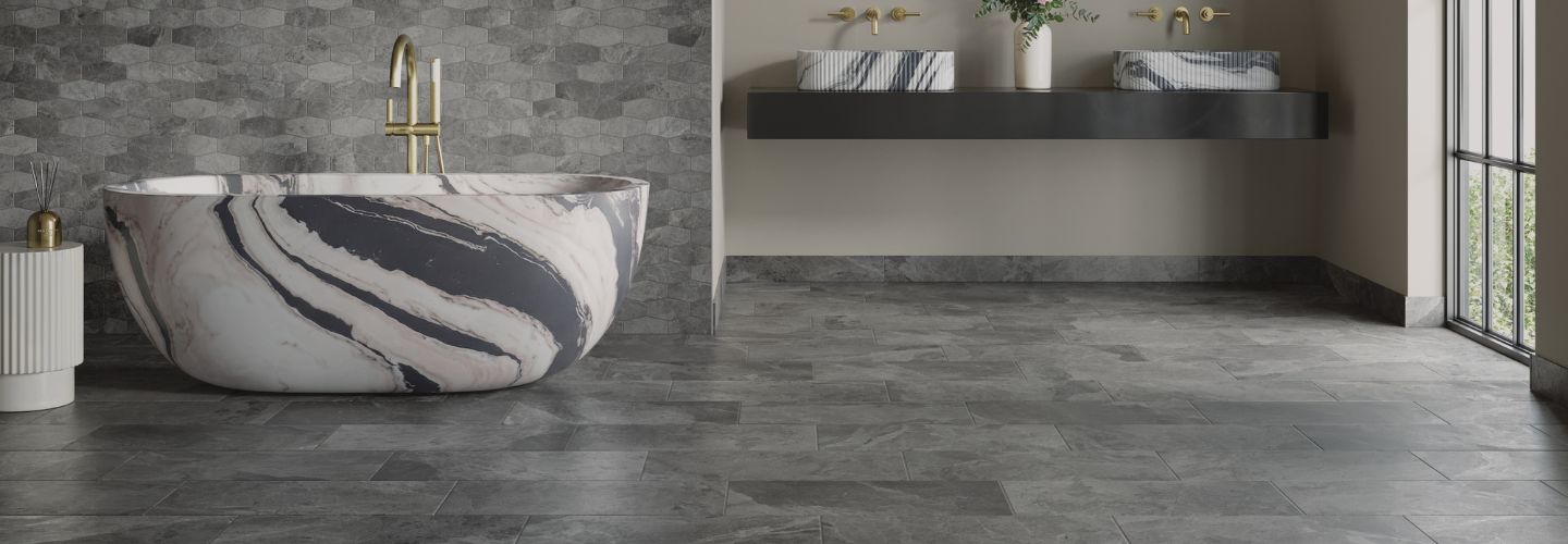 Bathroom with Cleve porcelain mosaics on wall and field tiles on floor 