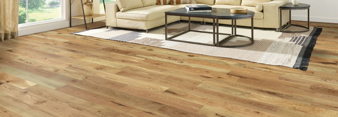 living room with natural hickory hardwood flooring