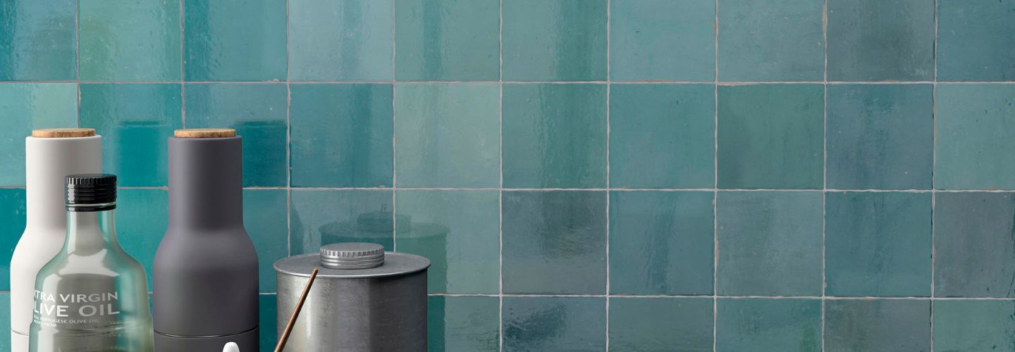 Zellige look wall tile in blue hues on kitchen backsplash
