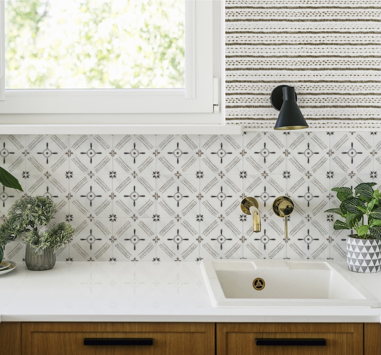 geometric pattern tile fireplace surround by stone impressions