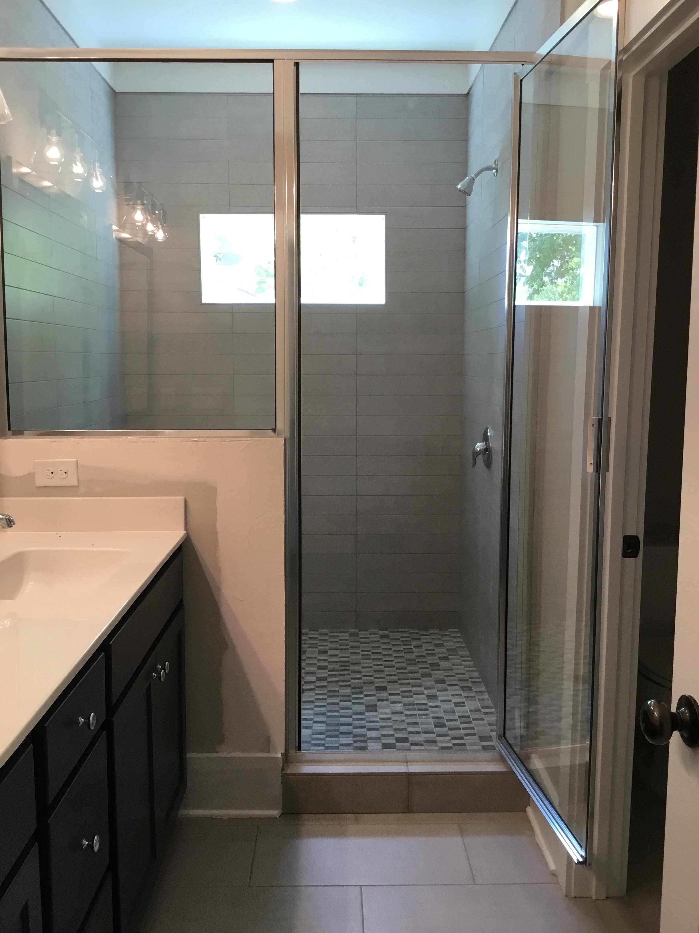 Shower with white tile 