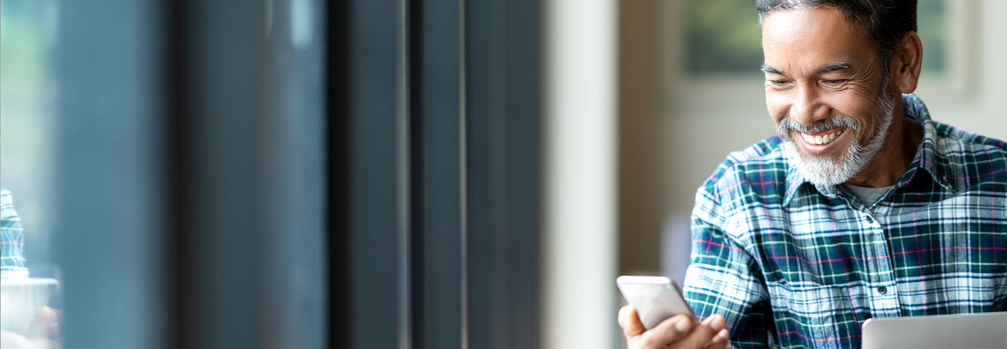happy customer sending a text message to sales team