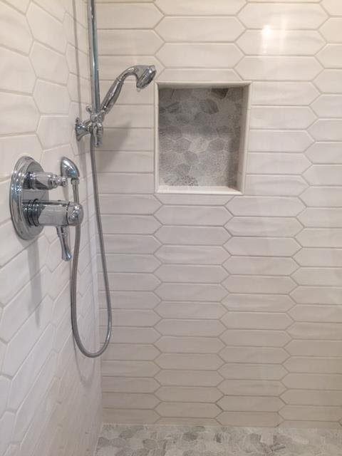 Shower with white tile 